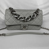 CHANEL
Medium Flap In grey Quilted Lambskin Leather With Resin Bi-Colour Chain