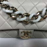CHANEL
Medium Flap In grey Quilted Lambskin Leather With Resin Bi-Colour Chain