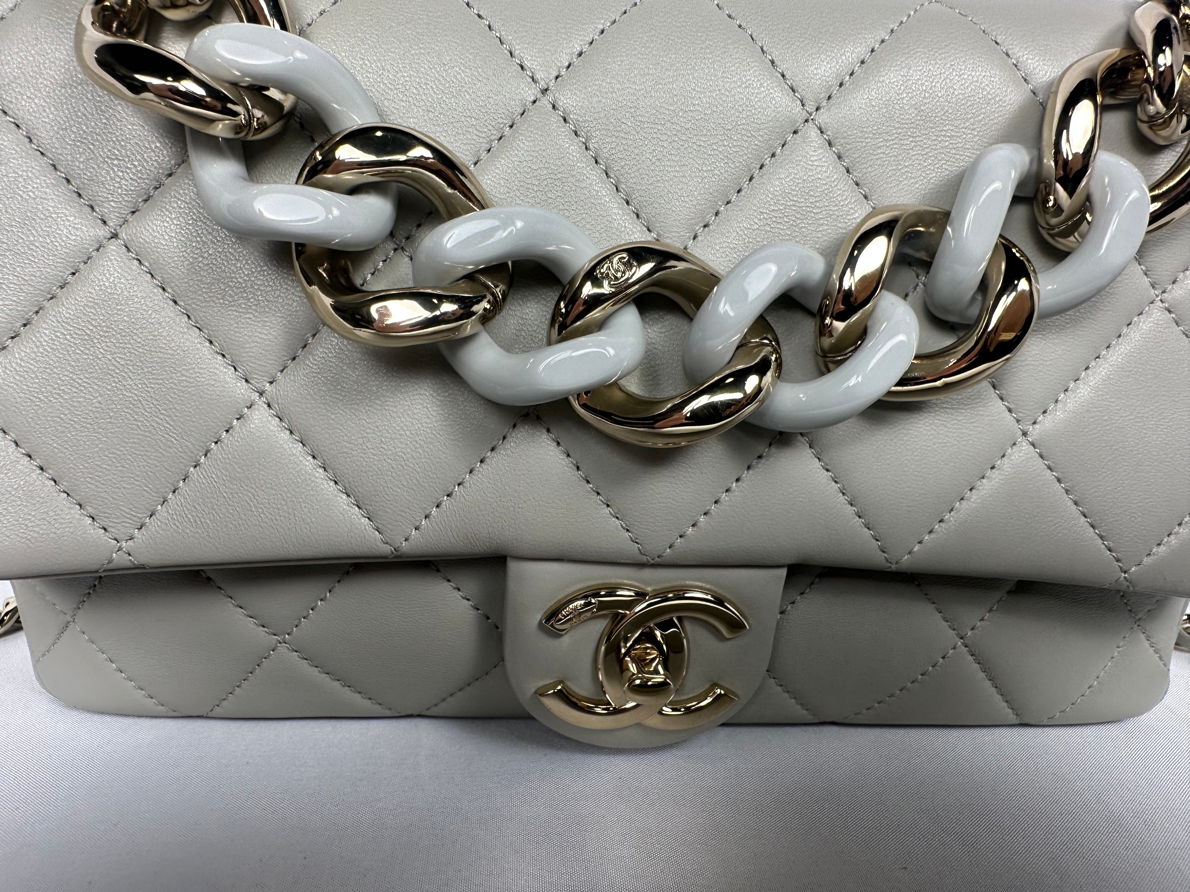 CHANEL
Medium Flap In grey Quilted Lambskin Leather With Resin Bi-Colour Chain
