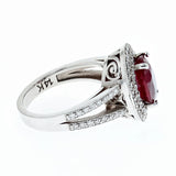 2ct oval Ruby and diamond double halo ring