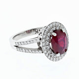 2ct oval Ruby and diamond double halo ring