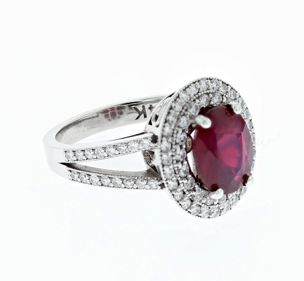 2ct oval Ruby and diamond double halo ring