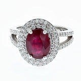 2ct oval Ruby and diamond double halo ring