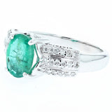 1.63ct oval cut emerald and diamond ring