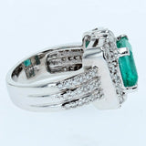 3.25ct emerald cut emerald and diamond ring