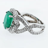 4.7CT Emerald and diamond Crossover Ring