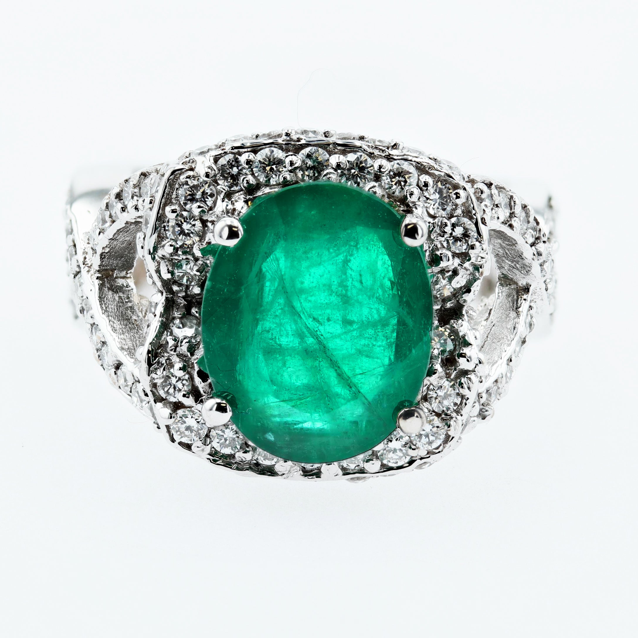 4.7CT Emerald and diamond Crossover Ring