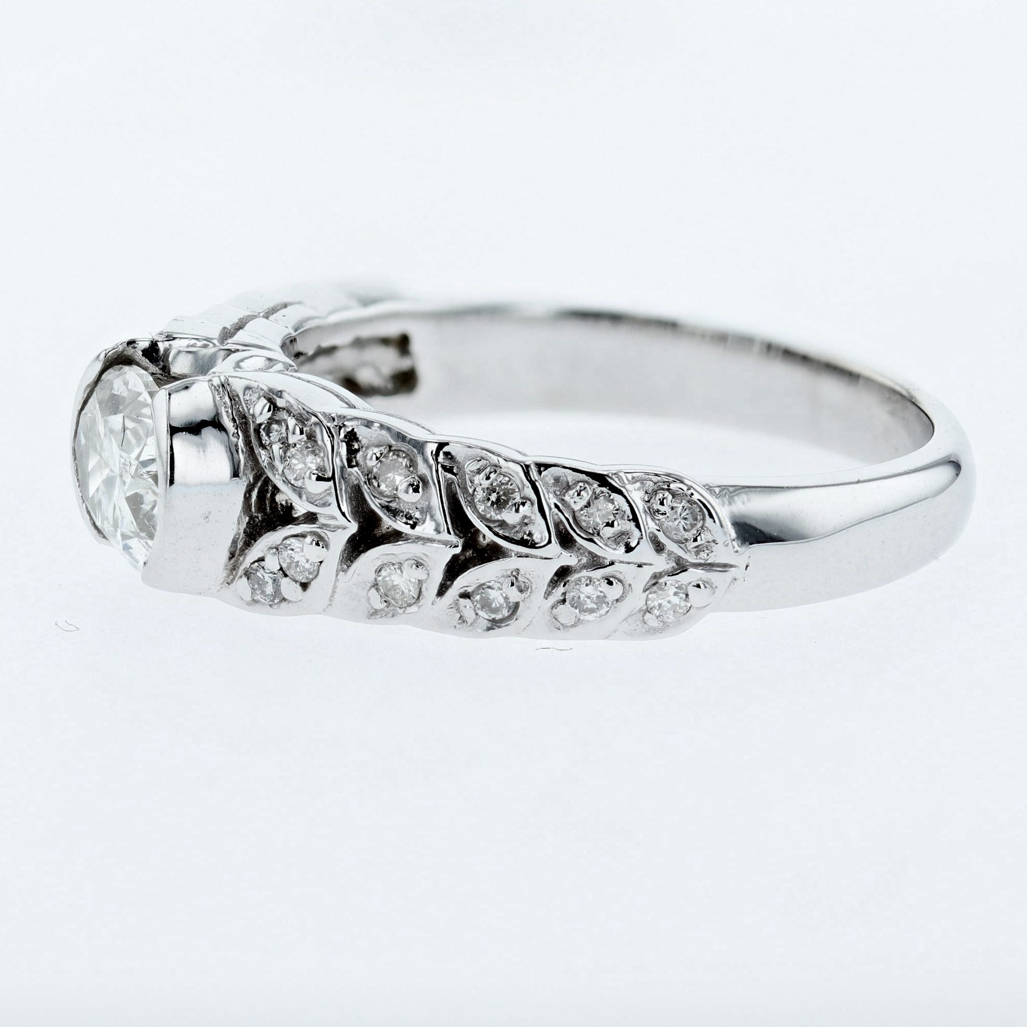 0.99CT/TW Oval Diamond Leaf Engagement Ring