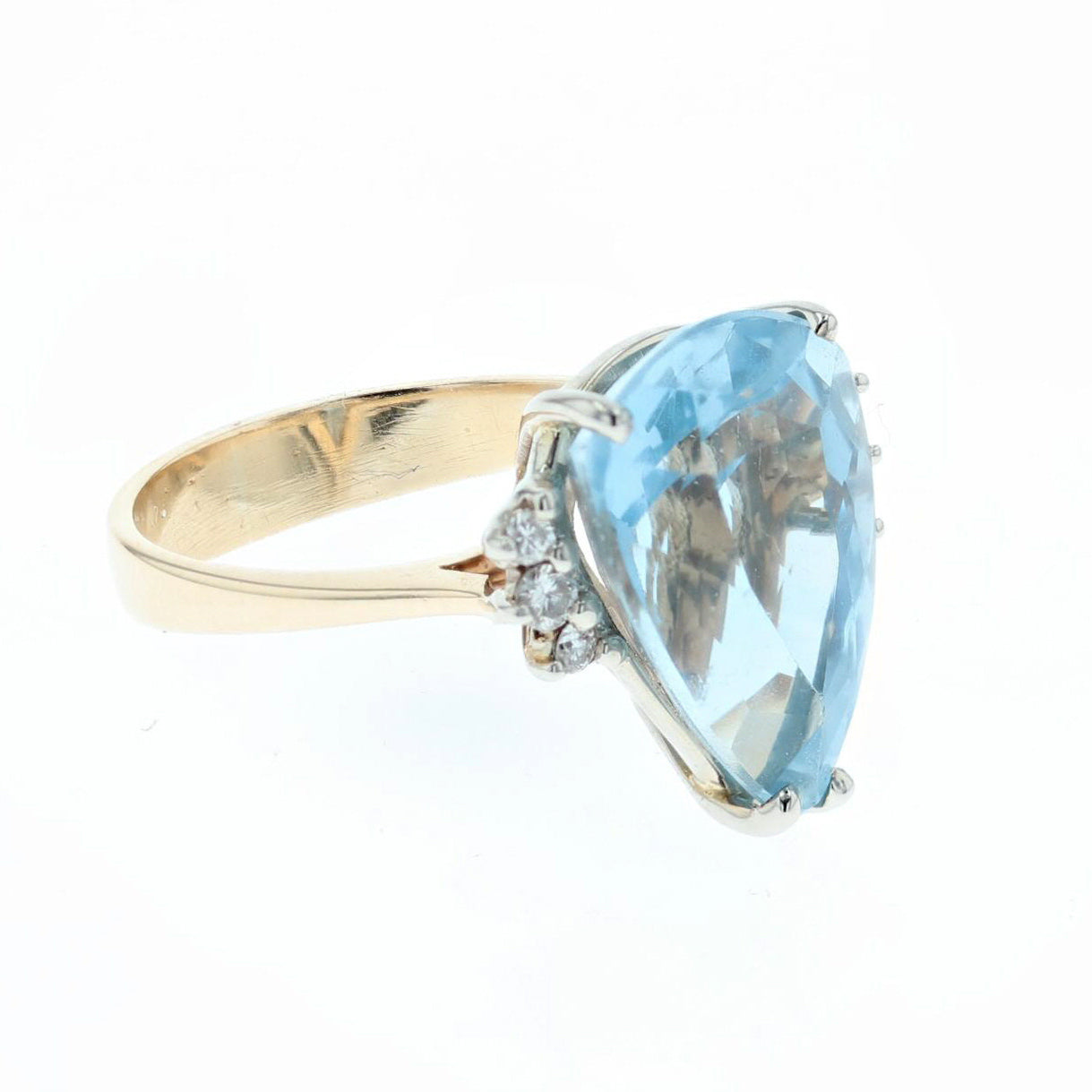 14K pear shape topaz and diamond ring